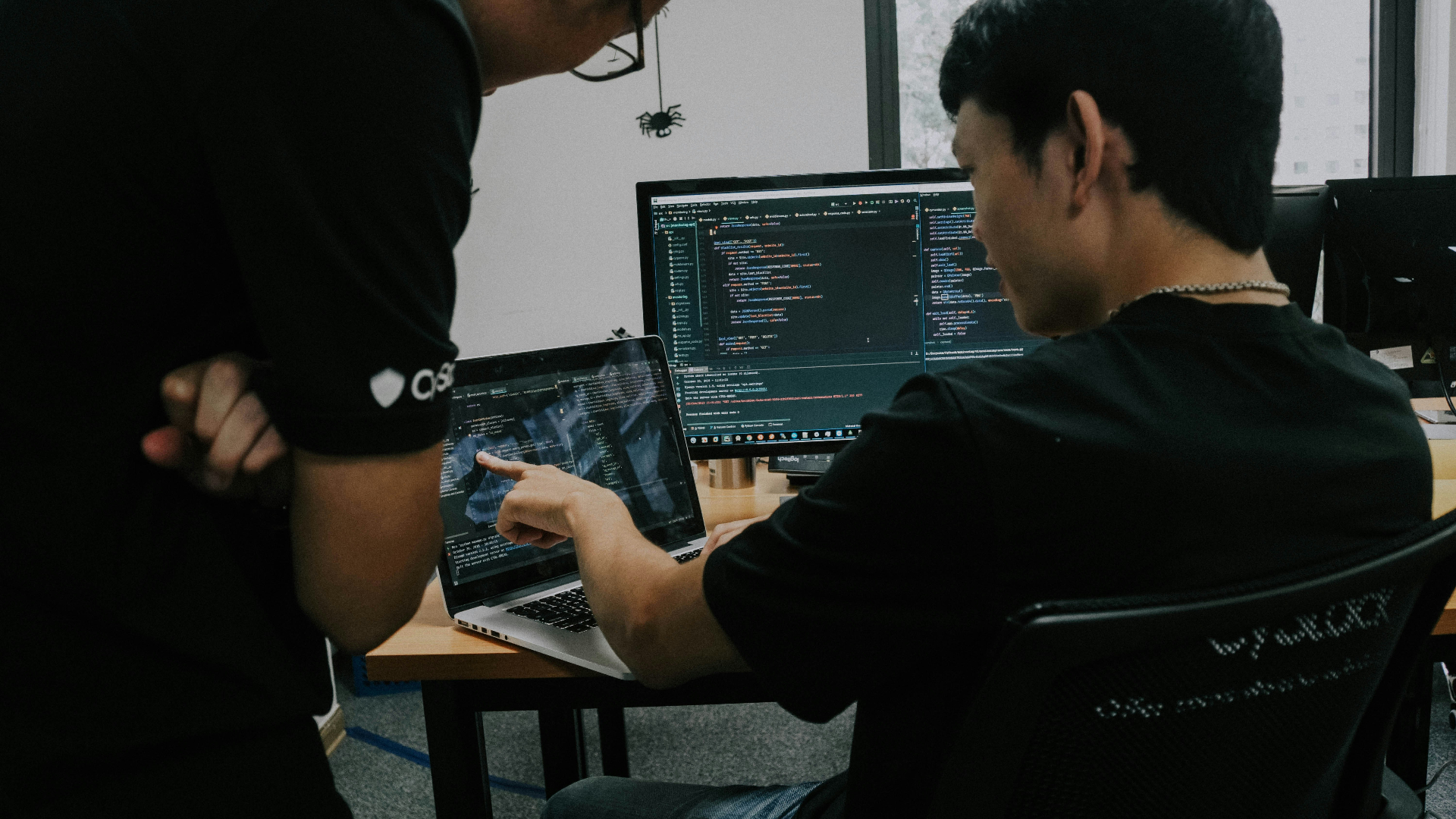 Developers reviewing code together.