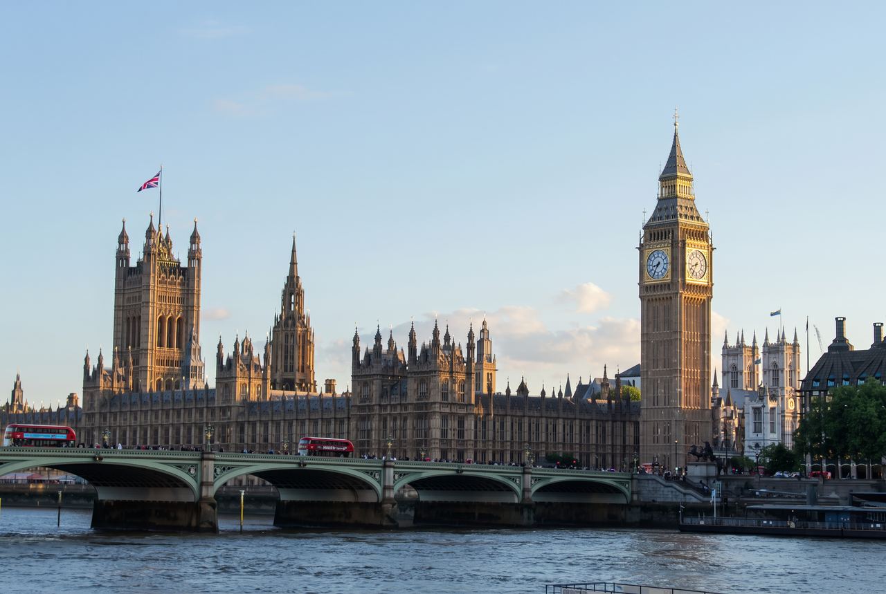 Big Ben and the Palace of Westminster seen across the River Thames, with Westminster Bridge in front