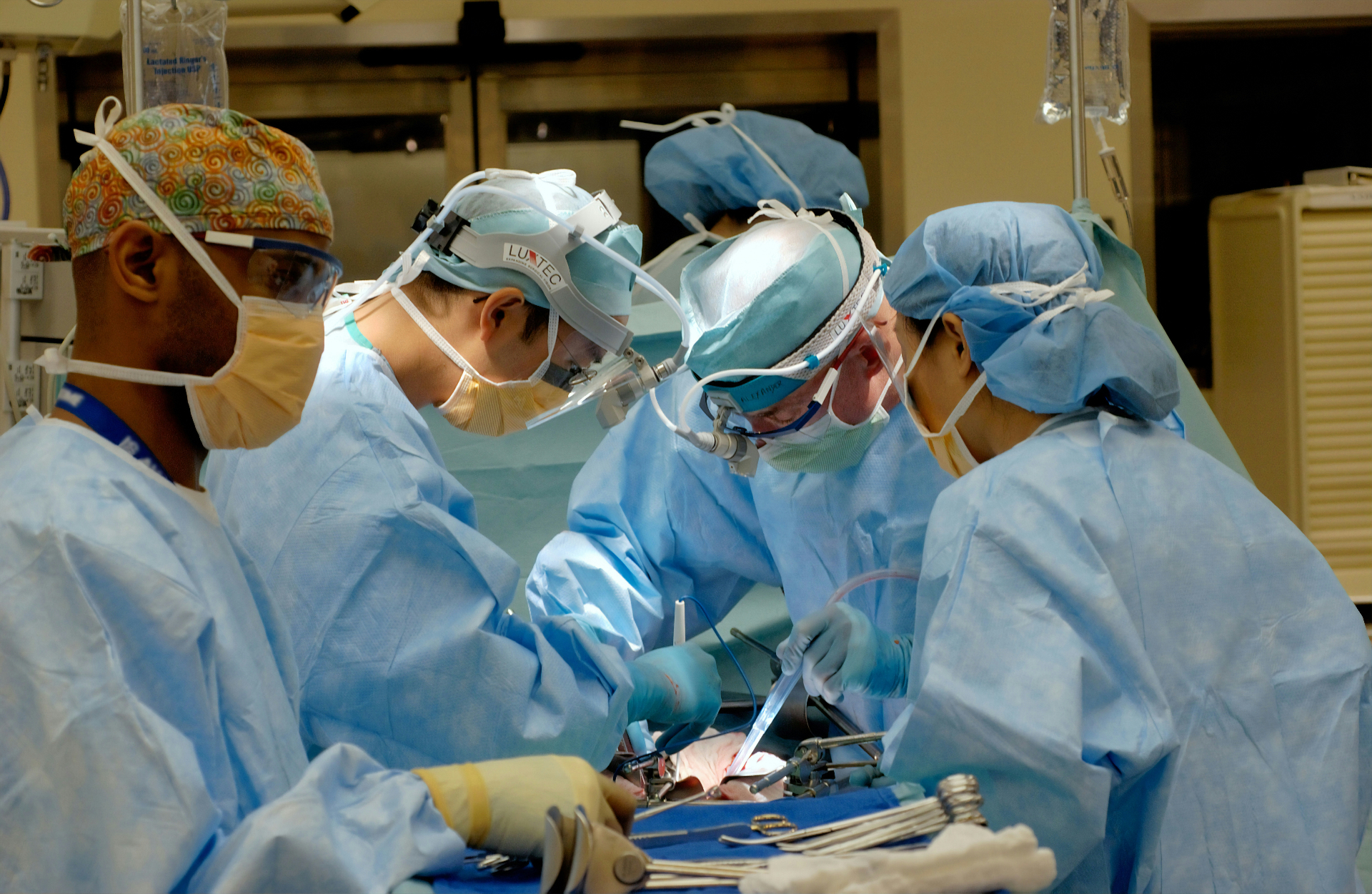 Surgical team performing an operation.